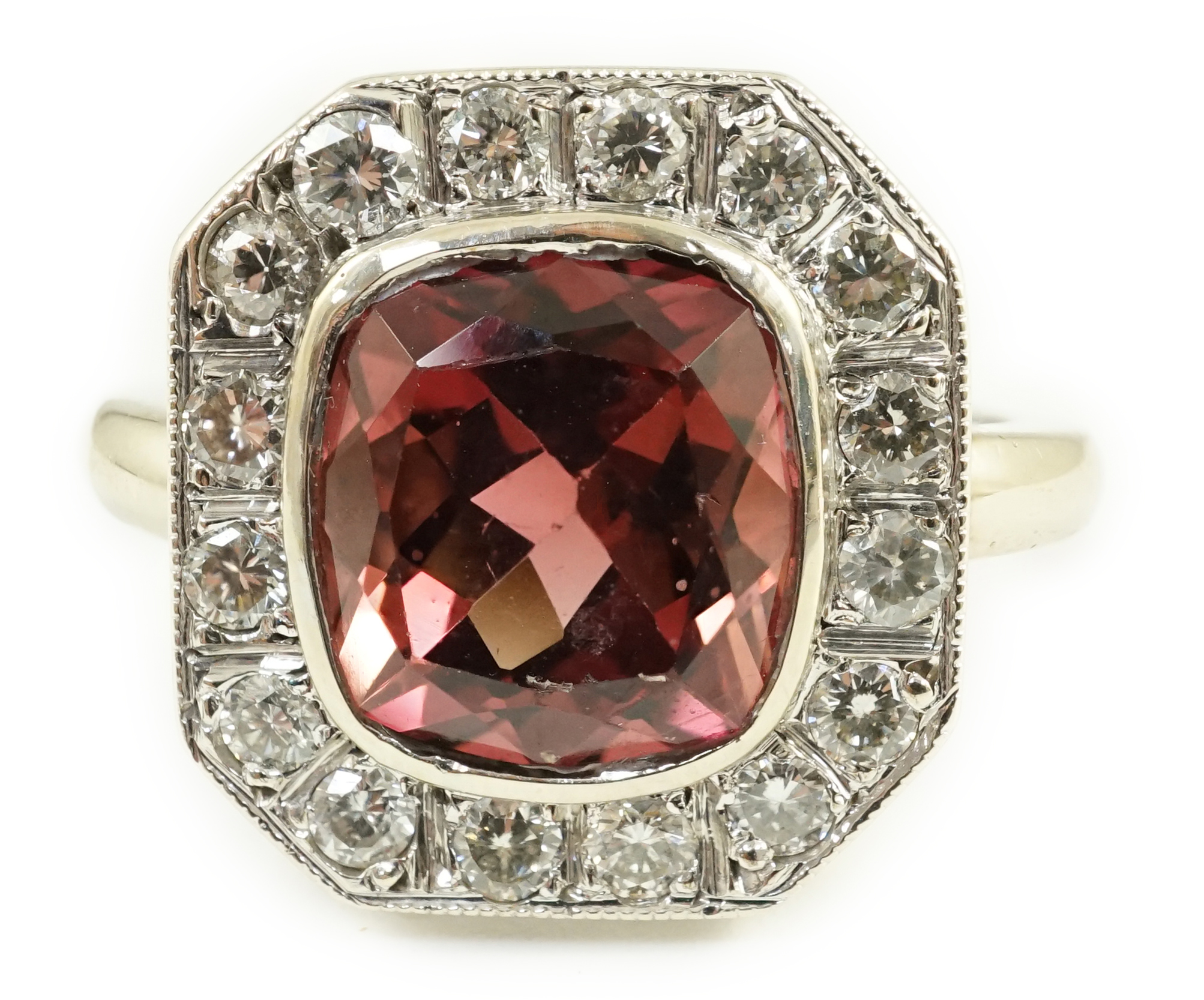 An 18ct white gold, tourmaline and diamond set octagonal dress ring